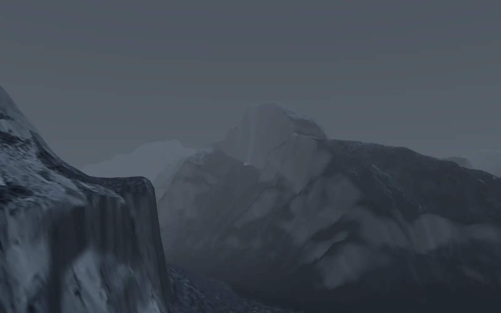 Half Dome rising through rain and low cloud above Yosemite Valley